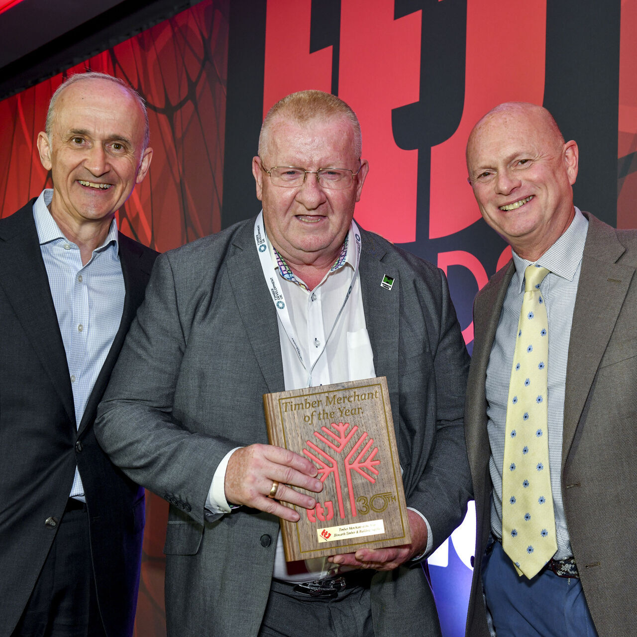 An image of Gary Froggatt, Timber Category Manager collecting the awards.