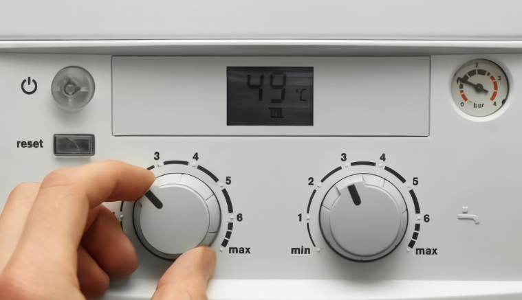 an image of a central heating system with dials being adjusted