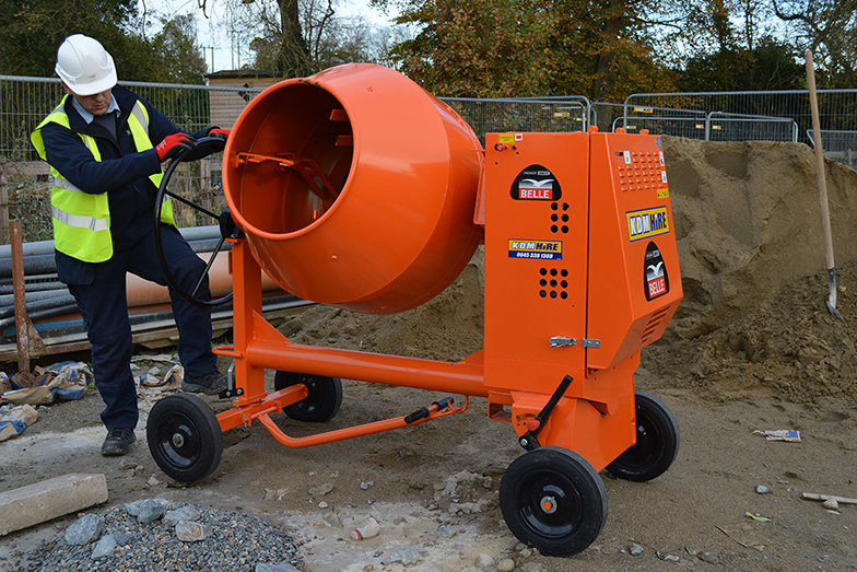 an image of a bright orange cement mixer 