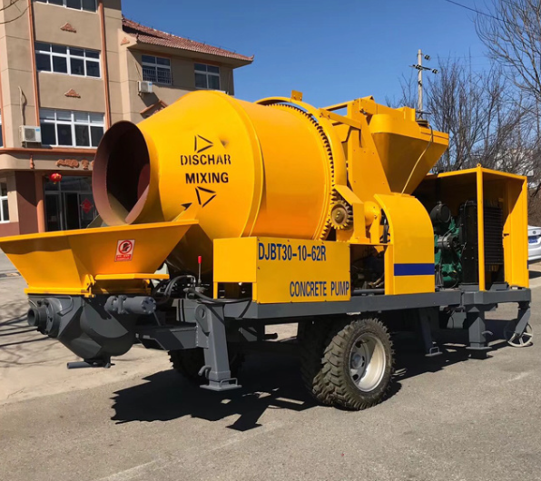 an image of a giant bright yellow cement mixer outside home