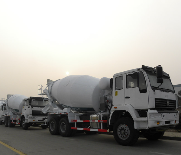 an image of white lorry cement mix vans