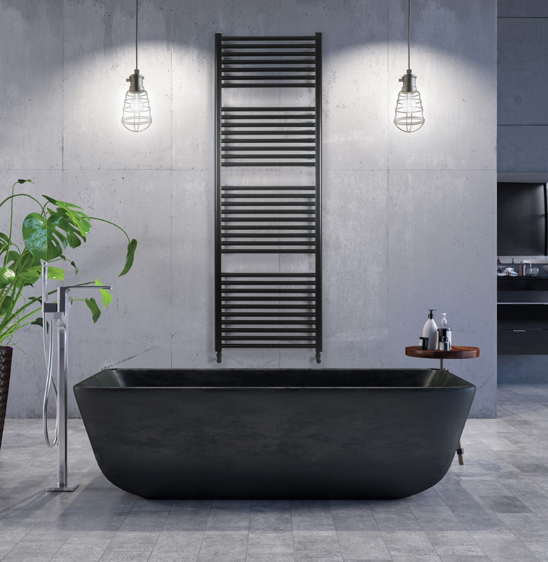 an image of a black ladder towel rail in a bathroom with a black bath.